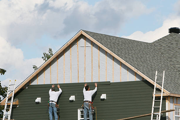 Professional Siding technician working in Welcome, NC